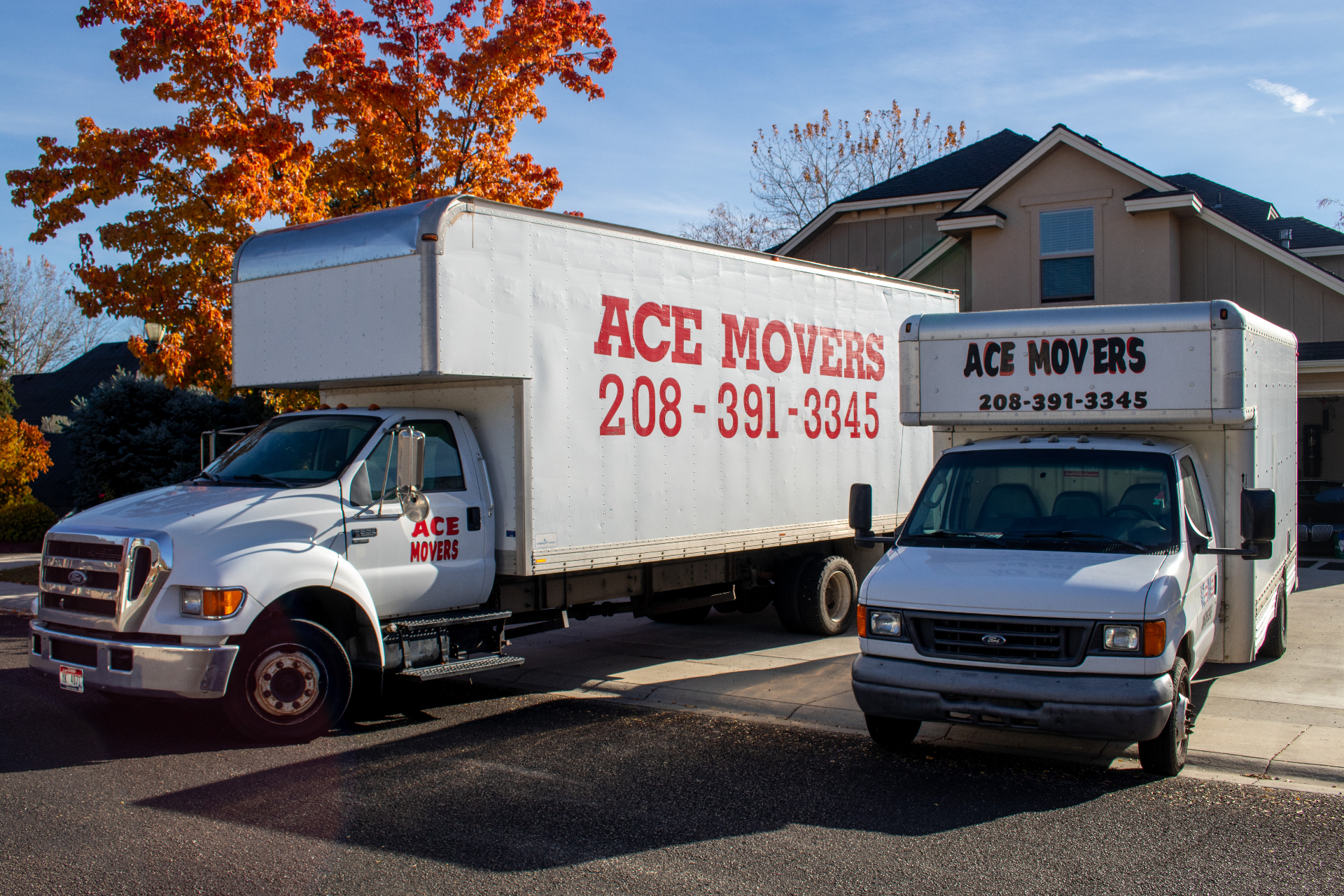 Ace Movers fleet — two trucks ready for moving day in Idaho